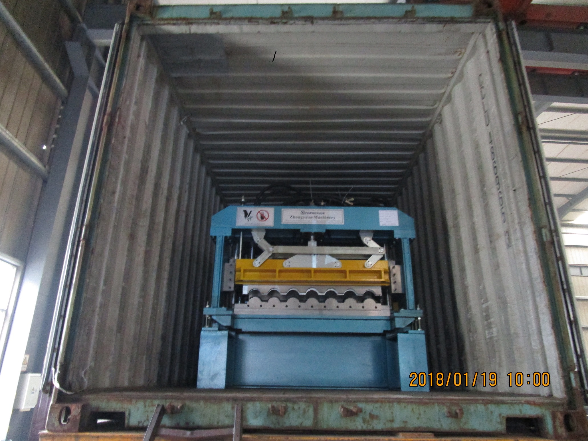 Máquina formadora de rollos Metrocopo Step Tile a Nigeria con fecha del 19 de enero de 2018