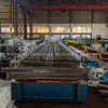 Máquina formadora de paneles de techo de metal con corte eléctrico